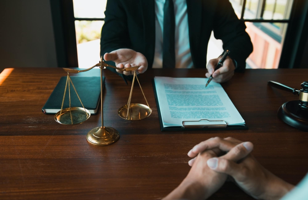 business-lawyer-is-currently-counseling-the-client-s-trial-at-the-lawyer-office-1-1-e1743872285259.jpg